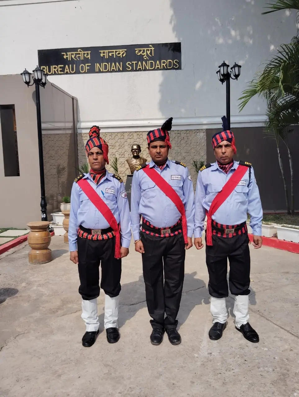 Three SMSA guards in ceremonial uniform on duty at the Bureau of Indian Standards